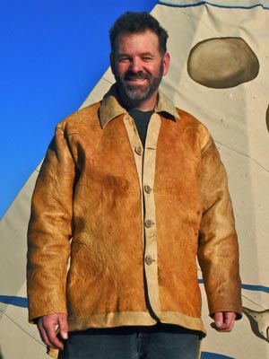 Thomas J. Elpel with a grain-on braintan buckskin jacket lined with rabbit fur.