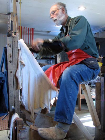 Regraining a deer hide.